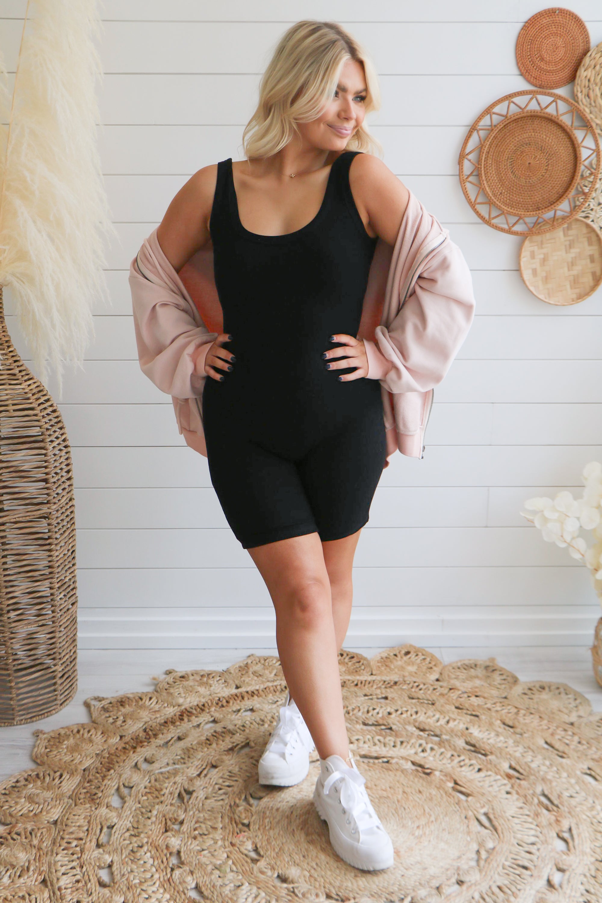 Taking Off Jacket in Blush